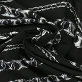 Satin viscose knit printed in black background chain