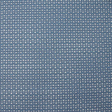 Punto de algodón estampado círculos y medias lunas carro fondo azul