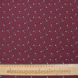 Cotton jersey with wine bottle print on wine background