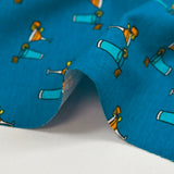 Cotton jersey cocktail print with turquoise background