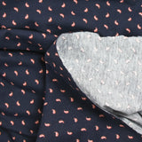 Punto de algodón con estampado de burbujas marrón y lunares azul marino