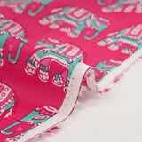 Indian cotton printed with turquoise elephant and pink background