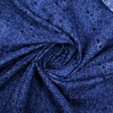 Cotton poplin printed with floral garden on a navy blue background