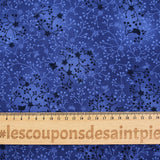 Cotton poplin printed with floral garden on a navy blue background