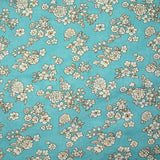 Off-white spring printed viscose with azurin blue background