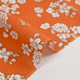 Off-white spring printed viscose with orange background