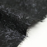 Pink silk and polyester jacquard in black swirl