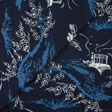 Algodón estampado japonés con fondo azul marino.