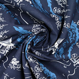 Algodón estampado japonés con fondo azul marino.