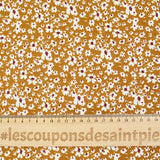 Viscose printed with white and burgundy flowers, ocher background