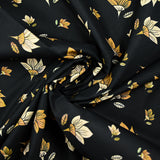 Cotton poplin printed pastel yellow flower and honey black background
