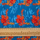 Cotton poplin printed stylized flower orange turquoise background
