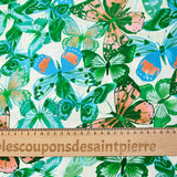 Viscose printed jacquard blue and green butterflies white background