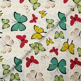 Cotton poplin printed with butterfly polka dots, beige white background