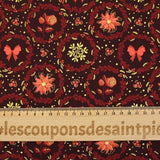 Popeline de coton imprimée poinsettias et nœuds orange fond marron