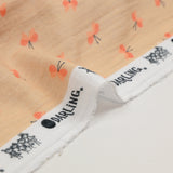 Double gauze printed butterfly on bisque background