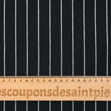 Dyed woven cotton with white stripes and black background