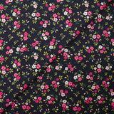 Cotton poplin printed mini pink flower on mineral blue background