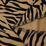 Flocked wool blend zebra black velvet camel background