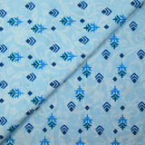 Cotton poplin printed flower symbol light blue arabesque background
