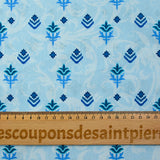 Cotton poplin printed flower symbol light blue arabesque background