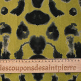 Printed viscose crepe with blotter effect, khaki background