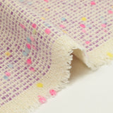 Wool blend tweed pink and blue confetti purple background