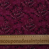 Cotton poplin printed with rustic romance on a purple background
