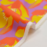Cotton elastane satin orange flowers purple background