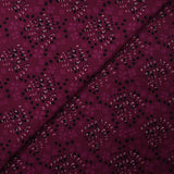 Cotton poplin printed with rustic romance on a purple background