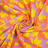 Cotton elastane satin orange flowers purple background