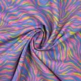 Cotton yellow and blue zebra print with pink background