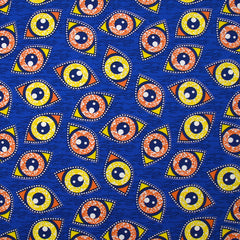 Coton imprimé ethnique Kampen orange et jaune fond bleu roi
