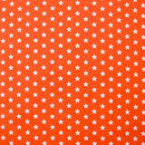 Coton imprimé étoile 1cm orange