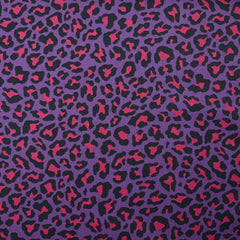 Coton imprimé léopard fuchsia fond violet