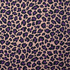 Coton imprimé léopard violet fond rose chair