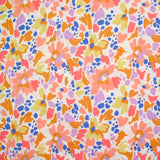 Coton imprimé Martina fleurs fantaisie pêche et camel au mètre