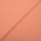 Crépon de polyester effet seersucker pêche