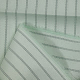 Striped cotton twill with pale green background