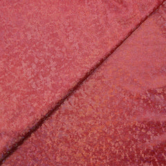 Jersey imprimé pois argentés holographiques fond corail