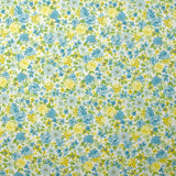 Piqué de coton imprimé les fleurs de Sarah bleu et jaune fond blanc