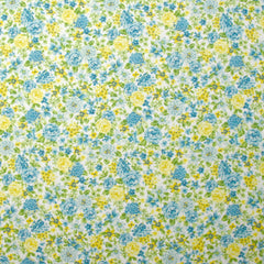 Piqué de coton imprimé les fleurs de Sarah bleu et jaune fond blanc