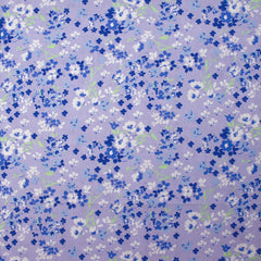 
Popeline de coton imprimée nuage de myosotis fond lavande
