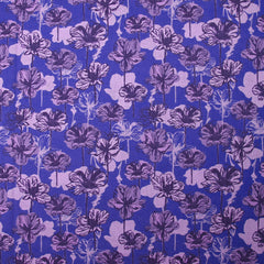 Popeline de coton imprimée silhouette en fleurs lilas fond indigo