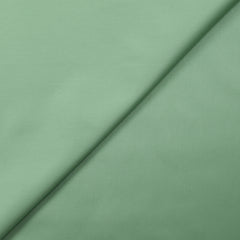 Popeline de coton satinée vert amande