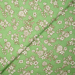 Viscose imprimée printanière blanc cassé fond vert clair