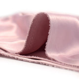 Crêpe satin polyester rose tendre